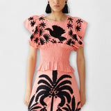 Stylish sleeveless top with palm trees and tropical birds
