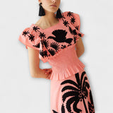 Stylish sleeveless top with palm trees and tropical birds