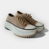 Modern sport shoes with thick soles